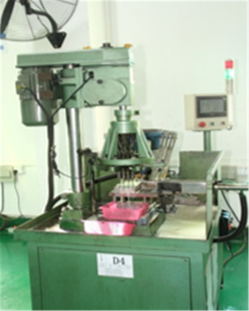 Gear tapping machine